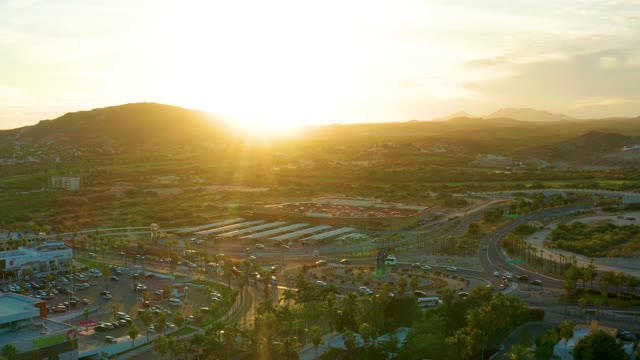 SAN JOSE DEL CABO BCS MEXICO-2020: Urban Highway at Sunset with Mountain Backdrop