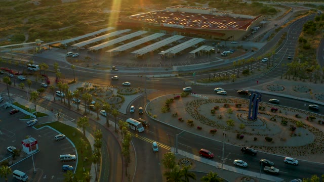 SAN JOSE DEL CABO BCS MEXICO-2020: Roundabout Traffic Transitioning From Sunset to Dusk
