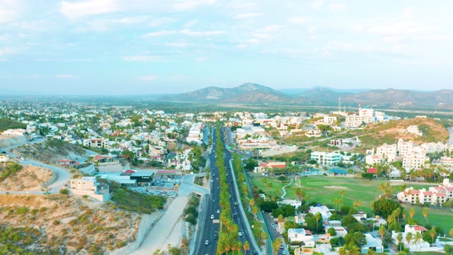 SAN JOSE DEL CABO BCS MEXICO-2020: City Street Traffic and Distant Hills From Above