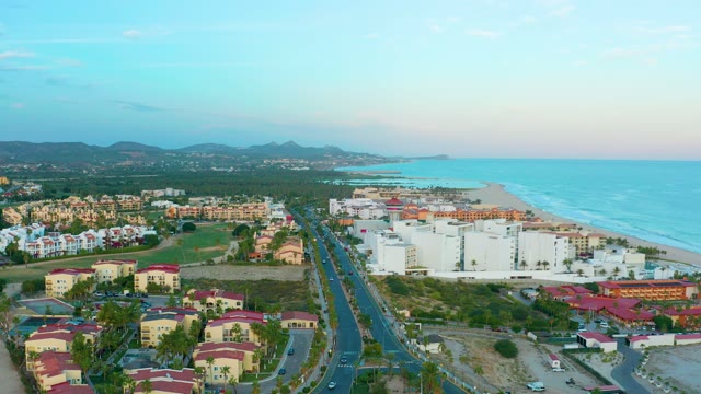 SAN JOSE DEL CABO BCS MEXICO-2020: Coastal Road with Car and Shifting Clouds