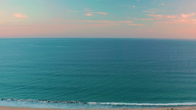 SAN JOSE DEL CABO BCS MEXICO-2020: Beach at Dusk with Gentle Ocean Waves and Moving Clouds