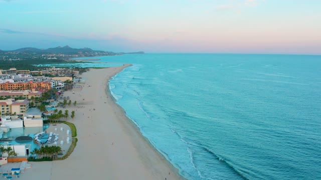SAN JOSE DEL CABO BCS MEXICO-2020: Coastal Beach with Ocean Waves and Resort Buildings