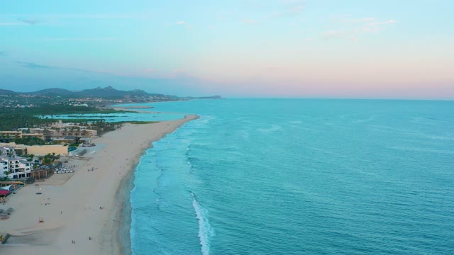 SAN JOSE DEL CABO BCS MEXICO-2020: Waves Rolling Toward Shore on a Sandy Beach