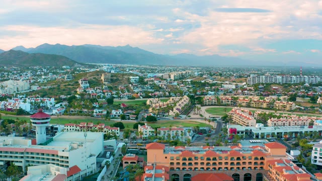 SAN JOSE DEL CABO BCS MEXICO-2020: Cityscape with Red-tiled Roofs and Mountain Backdrop