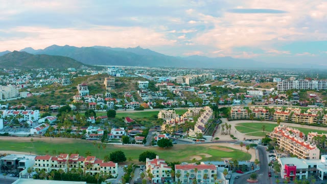 SAN JOSE DEL CABO BCS MEXICO-2020: Residential Neighborhood Aerial Pan with Mountain Backdrop