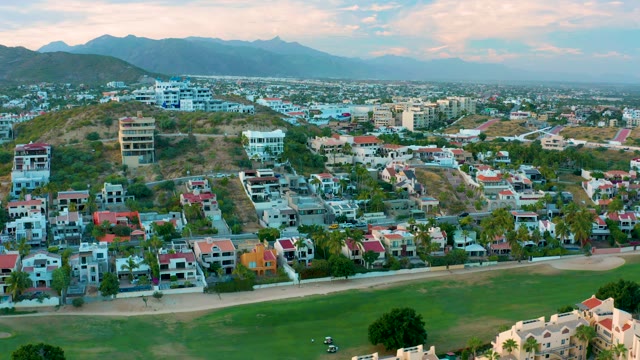 SAN JOSE DEL CABO BCS MEXICO-2020: Aerial Pan of Residential Neighborhood and Distant Mountains