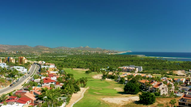SAN JOSE DEL CABO BCS MEXICO-2020: Coastal Road with Car and Golf Course Activity