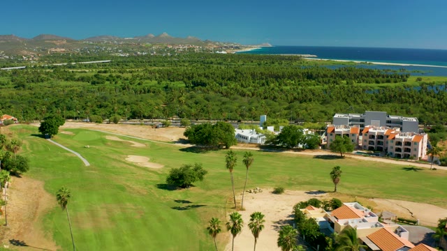 SAN JOSE DEL CABO BCS MEXICO-2020: Coastal Golf Course with Palm Trees and Buildings