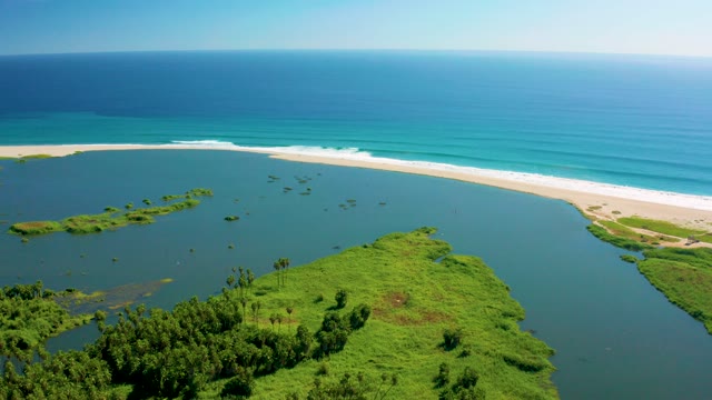 SAN JOSE DEL CABO BCS MEXICO-2020: Coastal River Flowing Into Ocean at Sandy Shore