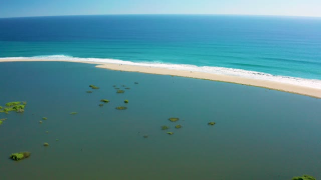 SAN JOSE DEL CABO BCS MEXICO-2020: Waves Rolling Along Curved Sandy Beach with Lagoon