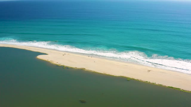 SAN JOSE DEL CABO BCS MEXICO-2020: Narrow Sandy Beach Between Ocean and Calm Water