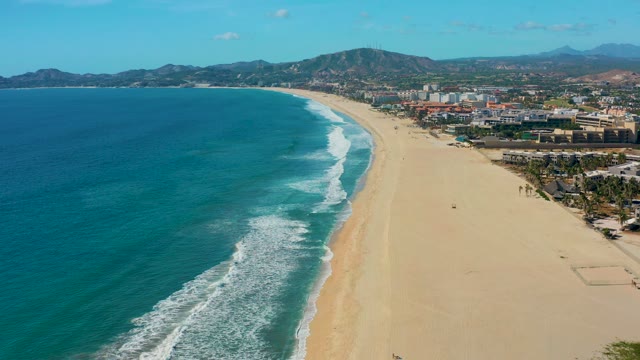 SAN JOSE DEL CABO BCS MEXICO-2020: Waves Rolling Onto Sandy Shore From Above