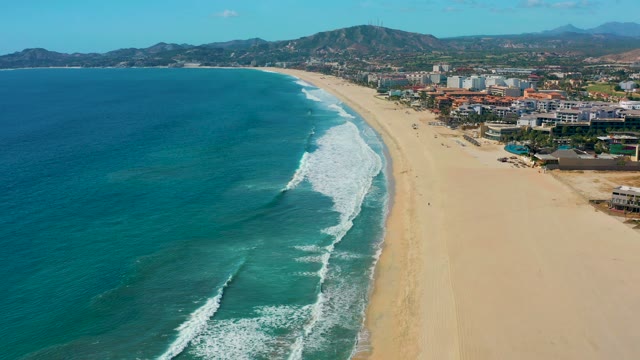SAN JOSE DEL CABO BCS MEXICO-2020: Waves Rolling Onto Sandy Beach From Above