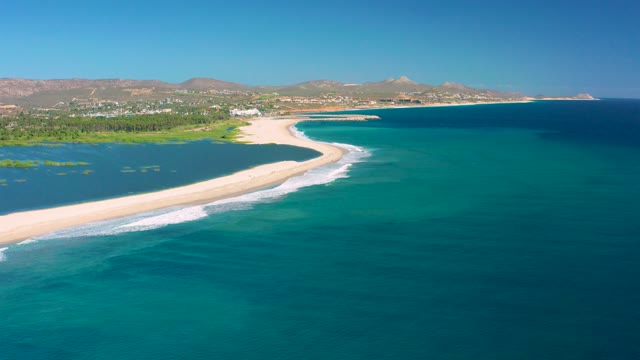 SAN JOSE DEL CABO BCS MEXICO-2020: Gentle Waves Rolling Along Sandy Coastal Spit