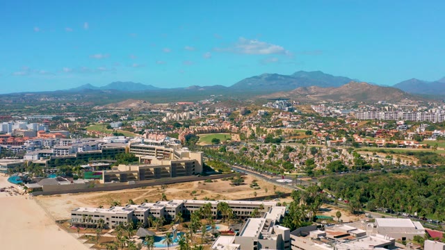 SAN JOSE DEL CABO BCS MEXICO-2020: Coastal Urban Landscape with Beach and Distant Mountains