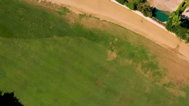 SAN JOSE DEL CABO BCS MEXICO-2020: Grassy Field Transitioning to Residential Property with Pool