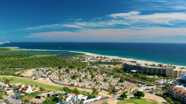 SAN JOSE DEL CABO BCS MEXICO-2020: Coastal Resort with Moving Vehicles and Sandy Beach