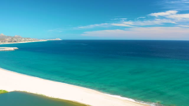 SAN JOSE DEL CABO BCS MEXICO-2020: Gentle Waves on a Sandy Beach with Turquoise Water