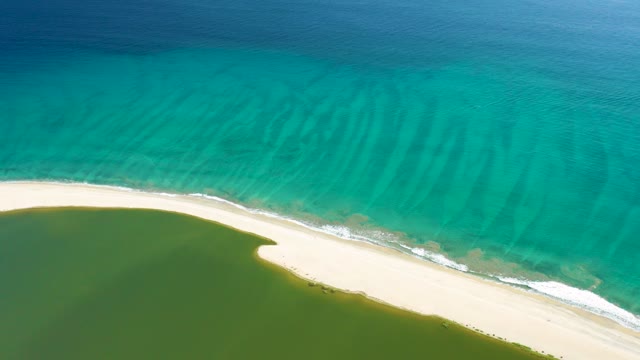 SAN JOSE DEL CABO BCS MEXICO-2020: Gentle Waves Lapping a Sandy Beach Shoreline