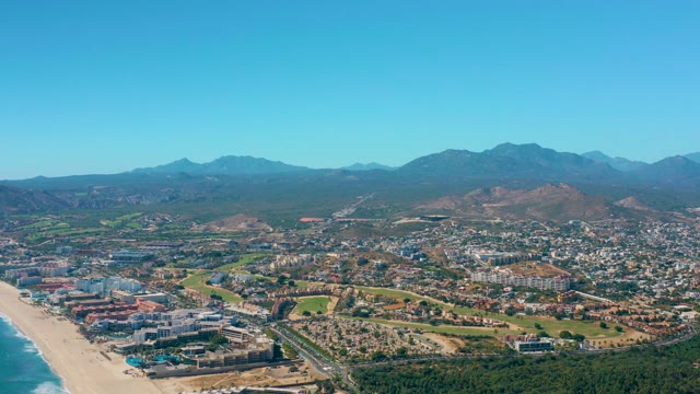 SAN JOSE DEL CABO BCS MEXICO-2020: Coastal Cityscape with Beach and Mountain Backdrop