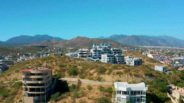SAN JOSE DEL CABO BCS MEXICO-2020: Hillside Buildings with Mountain Backdrop