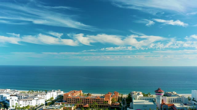 SAN JOSE DEL CABO BCS MEXICO-2020: Drifting Clouds Over Coastal Buildings and Ocean