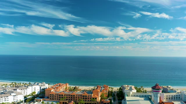 SAN JOSE DEL CABO BCS MEXICO-2020: Drifting Clouds Over Coastal Buildings and Ocean