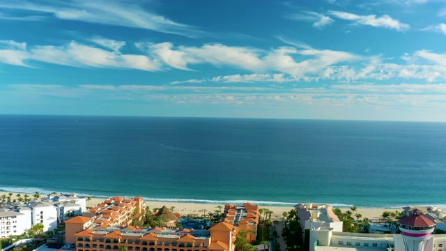 SAN JOSE DEL CABO BCS MEXICO-2020: Drifting Clouds Over Ocean and Coastal Buildings
