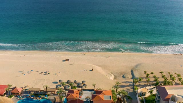 SAN JOSE DEL CABO BCS MEXICO-2020: Beach with Rolling Ocean Waves and Sunbathers