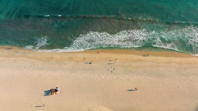 SAN JOSE DEL CABO BCS MEXICO-2020: Beachgoers Relaxing As Waves Roll In