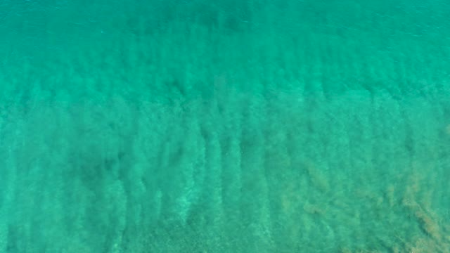 SAN JOSE DEL CABO BCS MEXICO-2020: Gentle Ripples on Clear Turquoise Ocean Water