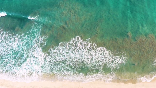 SAN JOSE DEL CABO BCS MEXICO-2020: Gentle Ocean Waves Rolling Onto Sandy Shore