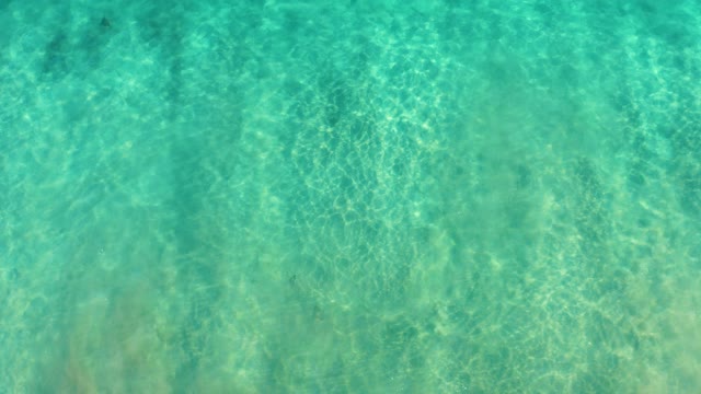 SAN JOSE DEL CABO BCS MEXICO-2020: Shallow Ocean Waves Breaking with Clear Turquoise Water