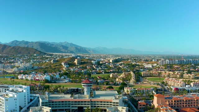 SAN JOSE DEL CABO BCS MEXICO-2020: Cityscape with Bird Flying Across Frame