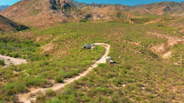 CABO PULMO BCS MEXICO-2020: Winding Dirt Road Through Hilly Desert Landscape