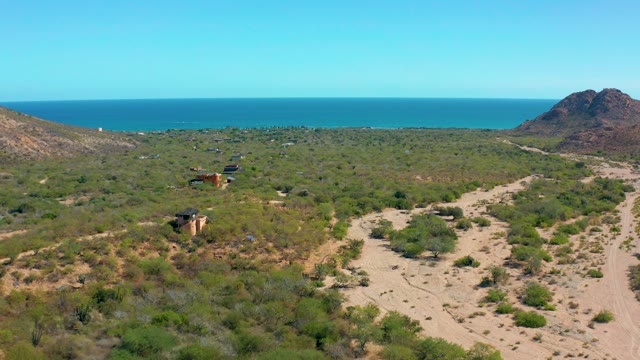 CABO PULMO BCS MEXICO-2020: Vehicle Driving Through Coastal Desert Landscape