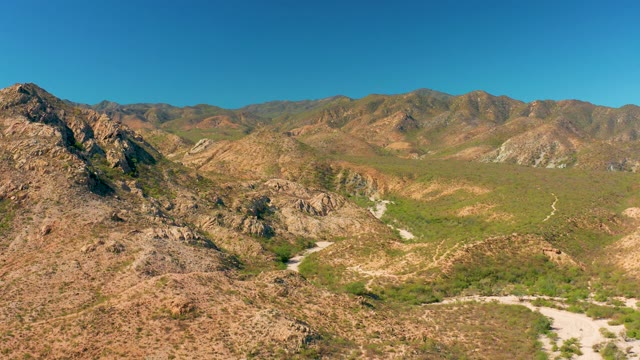 CABO PULMO BCS MEXICO-2020: Winding Dirt Road Through Mountain Valley