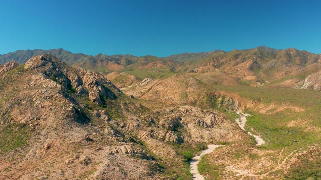 CABO PULMO BCS MEXICO-2020: Winding Dirt Road Through Rocky Mountain Valley