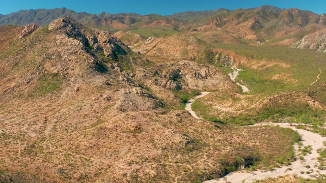 CABO PULMO BCS MEXICO-2020: Winding Dirt Road Through Mountainous Terrain