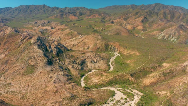 CABO PULMO BCS MEXICO-2020: Winding Dirt Road Through Mountain Valley
