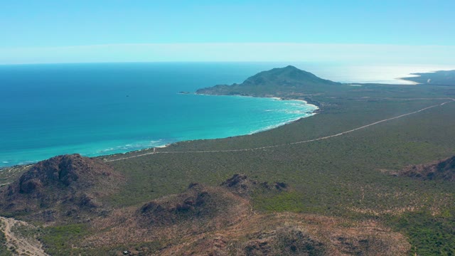 CABO PULMO BCS MEXICO-2020: Coastal Road by Turquoise Ocean and Rocky Hills