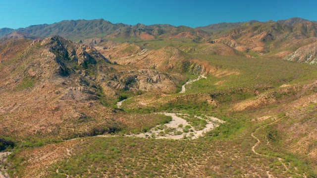 CABO PULMO BCS MEXICO-2020: Winding Dirt Path Through Rugged Mountain Terrain