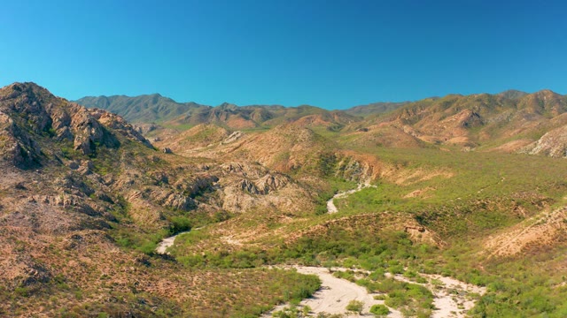 CABO PULMO BCS MEXICO-2020: Winding Mountain Road with Moving Vehicle