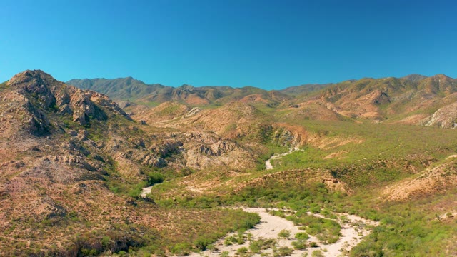 CABO PULMO BCS MEXICO-2020: Winding Dirt Road Through Mountain Valley