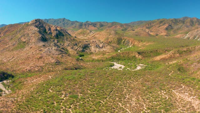 CABO PULMO BCS MEXICO-2020: Arid Mountain Valley with Rocky Slopes and Sparse Greenery