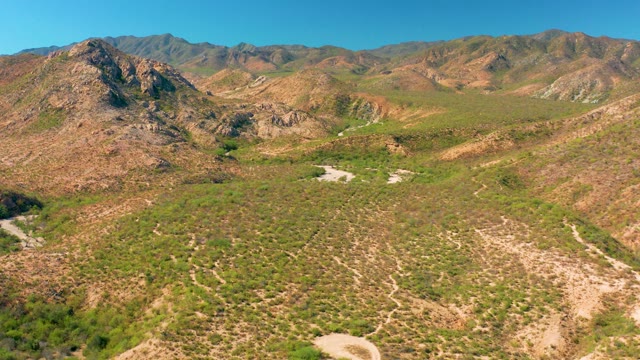 CABO PULMO BCS MEXICO-2020: Vehicle Moving Along Mountain Valley Dirt Road