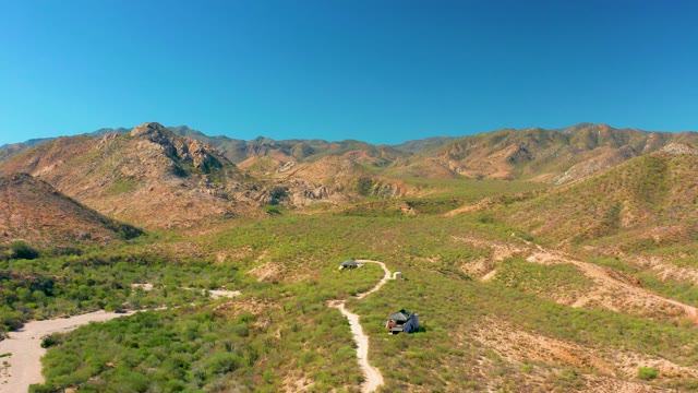 CABO PULMO BCS MEXICO-2020: Vehicle Traveling on Winding Mountain Dirt Road