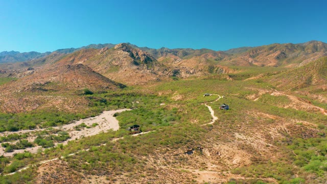 CABO PULMO BCS MEXICO-2020: Vehicles Moving on Mountain Dirt Road