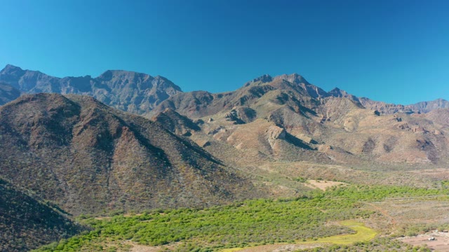 LORETO BCS MEXICO-2020: Panning View of Mountain Valley and Greenery