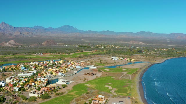 LORETO BCS MEXICO-2020: Boat Navigating Coastal Waterway Near Town